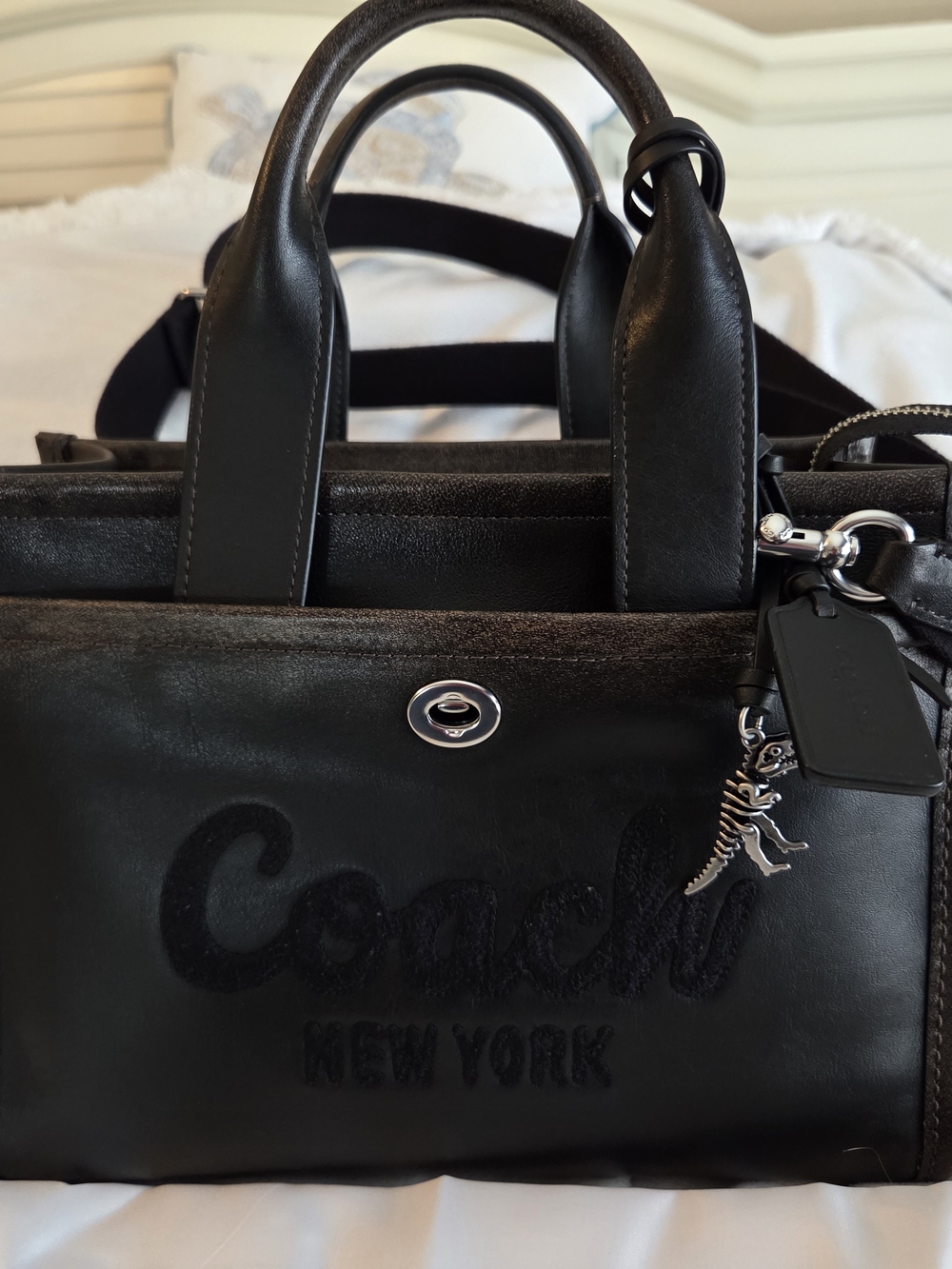 Coach Black Leather Satchel with Dinosaur Charm